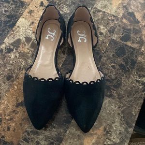 Woman’s black flat size 8